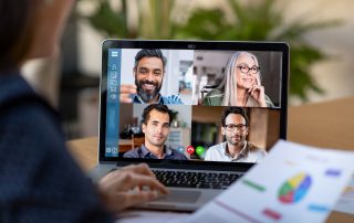 Person in a video conference call | Featured Image for Managing Online Meetings