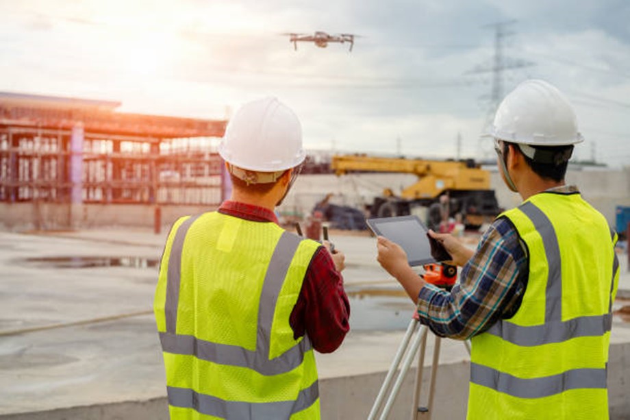 Workplace health and safety officers launching a drone on a work site | Featured image for Safety Innovations in the Workplace Blog by Bramwell Partners.