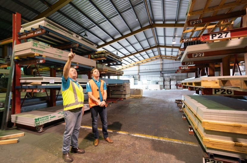 Bramwell Partners team looking around a warehouse | Featured image for the Environment Quality Assurance landing page from Bramwell Partners.