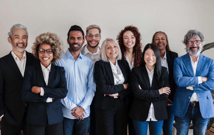 Multicultural team | Featured image for the Building a Winning Team – Part 4: The Importance of HR Onboarding blog by Bramwell Partners.