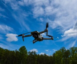 A drone in mid-flight | Featured Image for Previewing Future Health and Safety Policies in Australia blog.